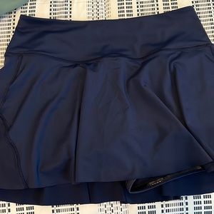 ATHLETA Woman’s Size Medium Ace Tennis Skort 13.5-Navy Blue